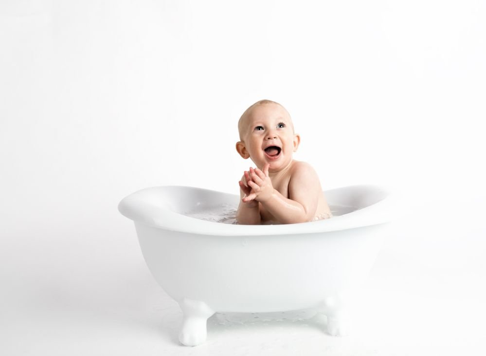 A baby in the tub - after baby proofing your home.