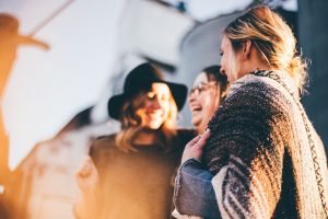 Girls laughing and enjoying one of the best coffee shops in suburbs