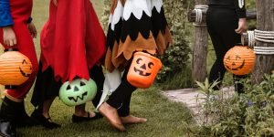 Kids in costumes going trick-or-treating. 